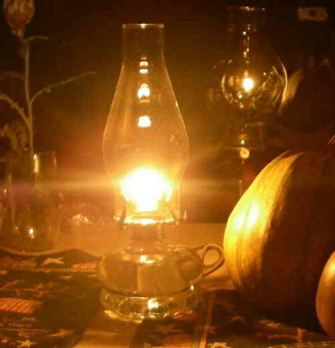 Oil lamp in autumn decor