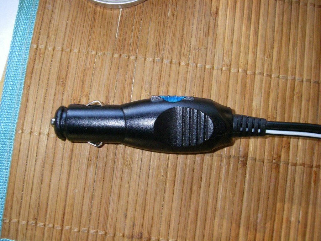If the fuse (blue bar in top of plug) joins positive to positive, then by looking at it, one would assume the black wire is positive. Right? Wrong, apparently (Photo: Mark Zeiger).