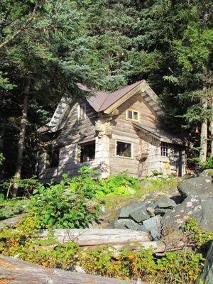 The beloved cabin in anniversary morning sunshine (Photo: Mark A. Zeiger).
