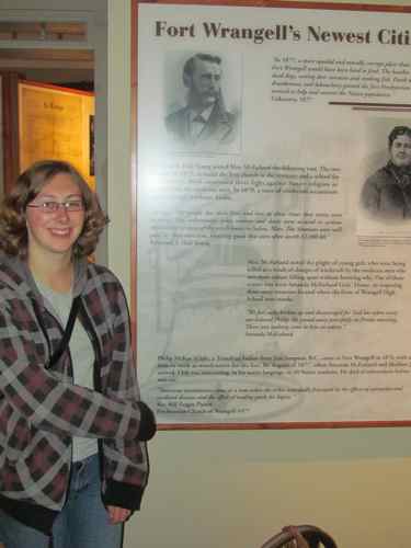 Aly next to museum placard with quote from her grandfather, Rev. Bill Zeiger (Photo: Mark A. Zeiger).