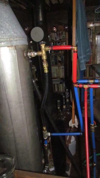 Wood-fired hot water heater plumbing